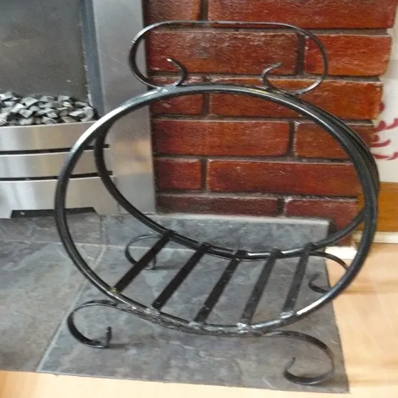 Wrought iron hand crafted round log basket Wimborne wrought iron works