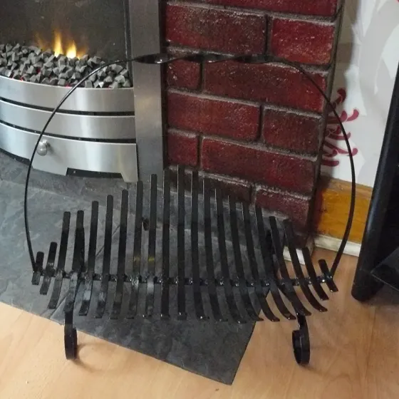 Wrought iron hand crafted black slatted log basket Wimborne wrought iron works