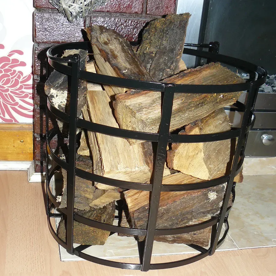 Log carrier Wrought iron black log carrier basket / storage Wimborne wrought iron works