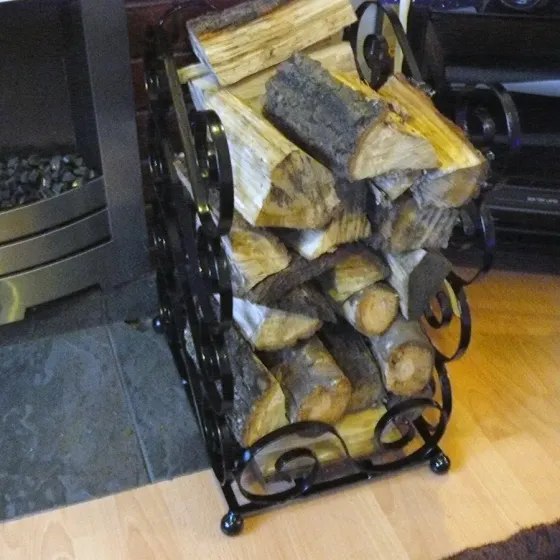 Log basket Wrought iron tall scrolled log basket Wimborne wrought iron works